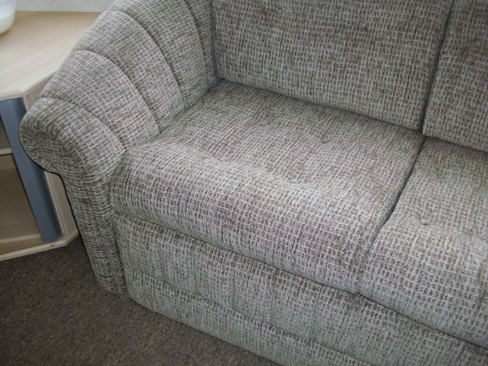 Free standing sofa re-upholstered in a mordern and hard wearing chenille fabric