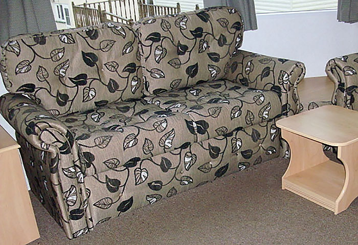 freestanding furniture suite re-upholstered in an attractive patterned fabric